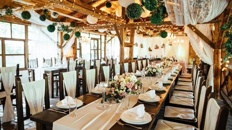 Rustic decorated indoors wedding venue. 